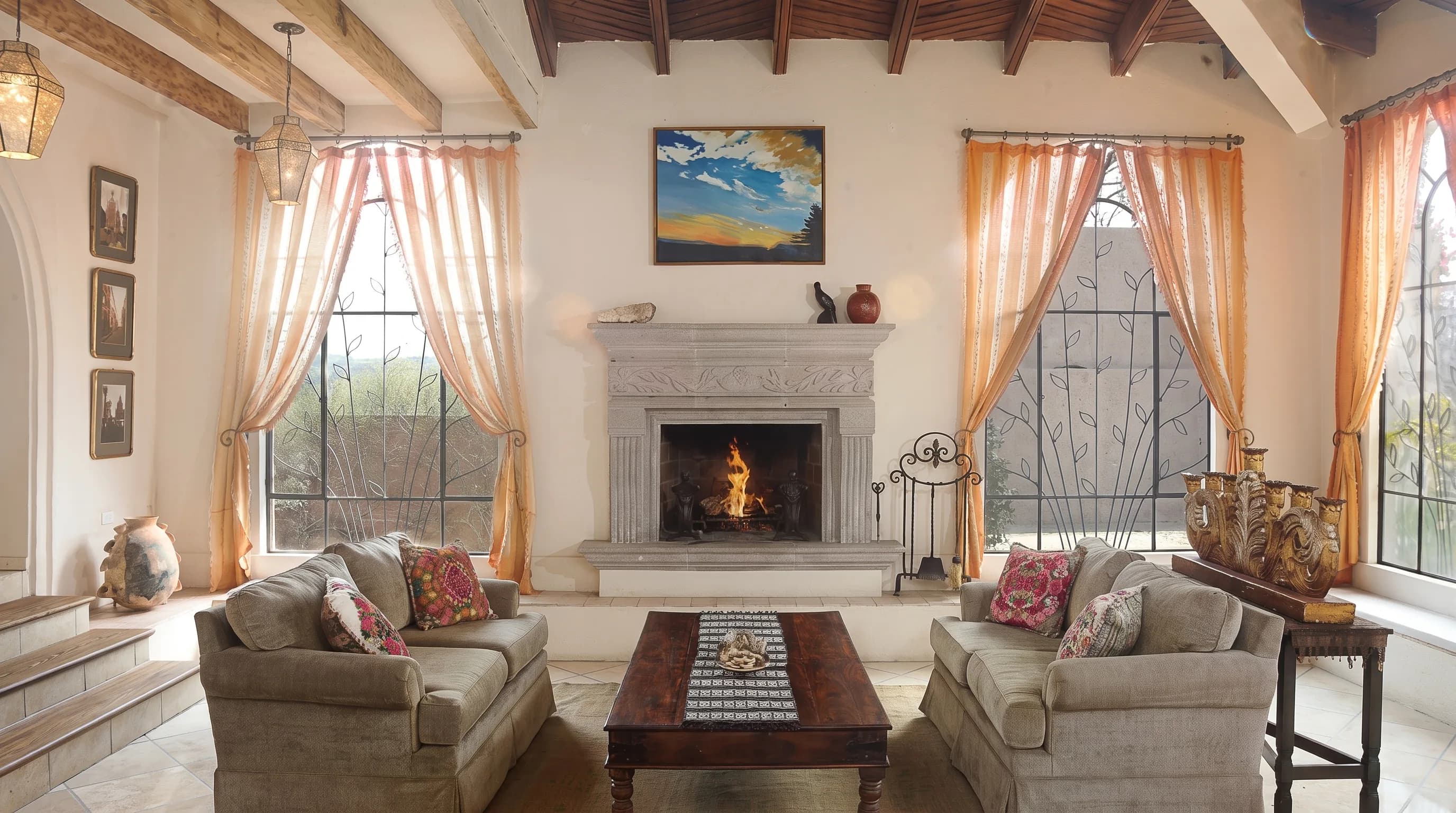 Great room fireplace and windows at Casa Jazmin
